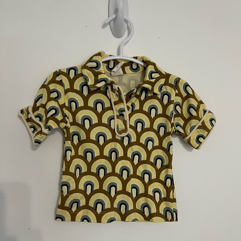 Kate Quinn polo style shirt